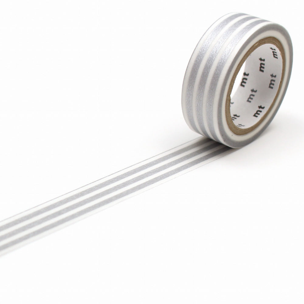 Silver washi tape with visible brand name on a white background