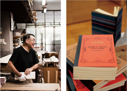 Three LIFE Noble Notebooks, made in Japan, are stacked in light blue, orange, and brown covers with ornate black borders and “Noble Notebook - 100 Sheets” branding. The notebooks are hand-made in their Japanese factory. The paper is fountain pen-friendly.