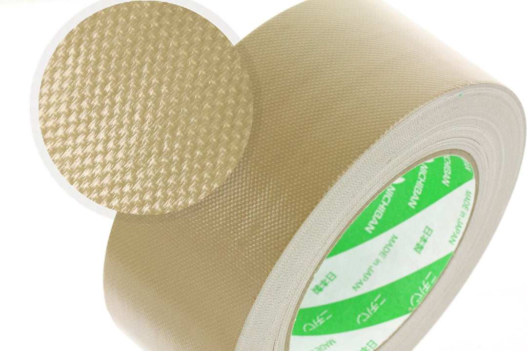 Roll of beige tape with textured surface and green label on a white background