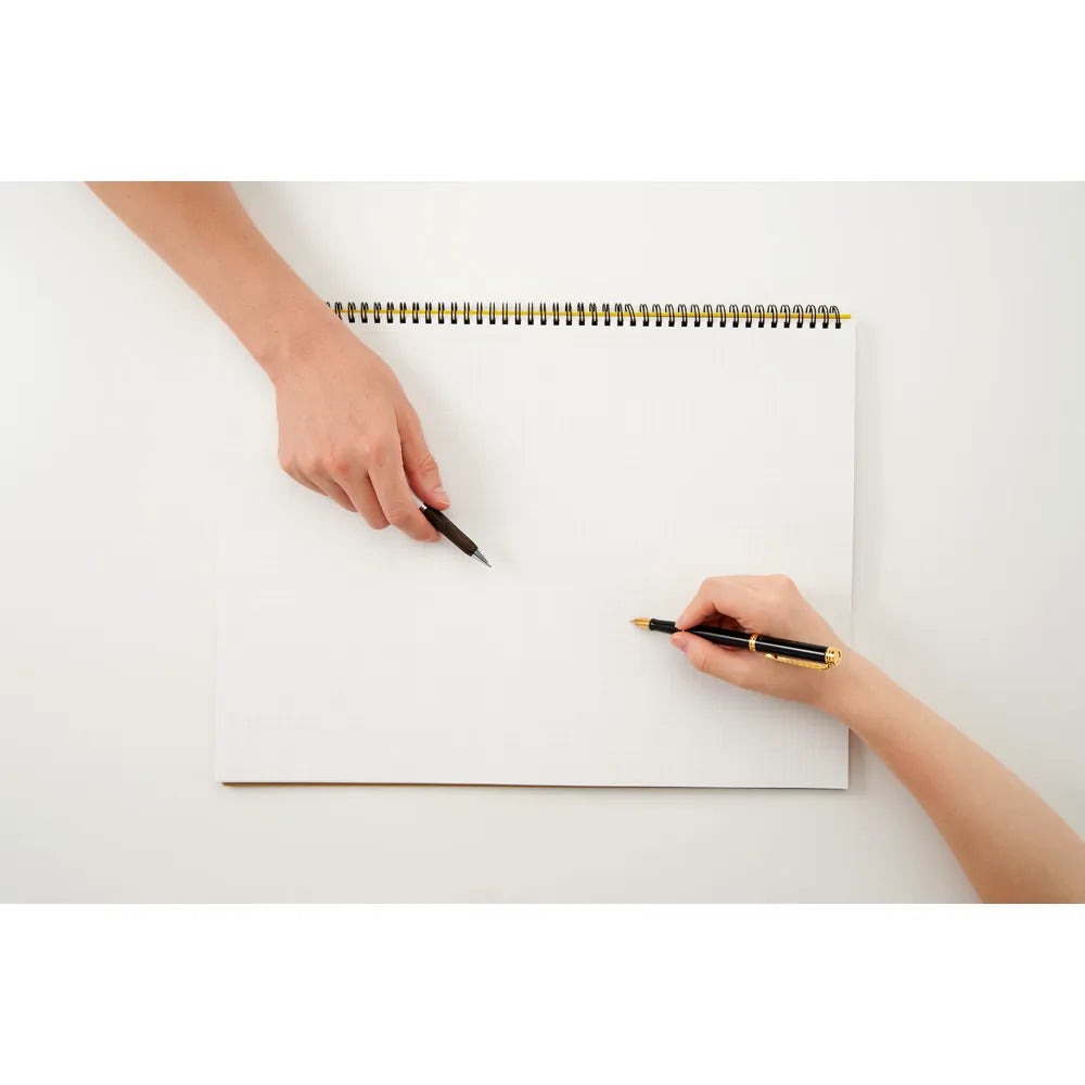 Two hands holding pens over a white surface with a spiral-bound notebook. #paper-size_a3