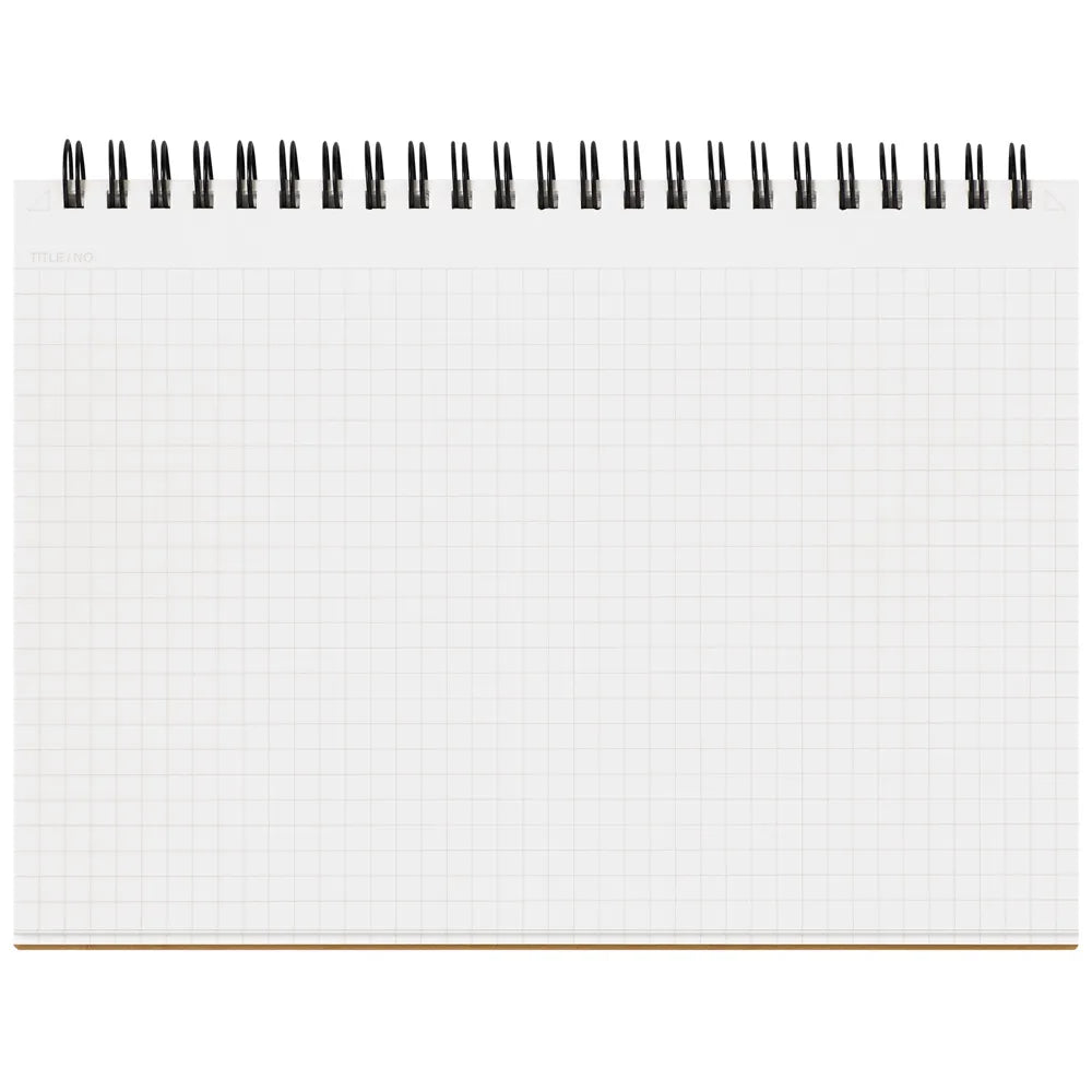 White grid notebook with black wire binding on a white background #paper-size_a5