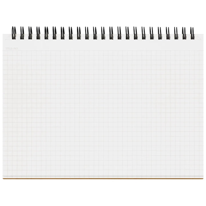 White grid notebook with black wire binding on a white background #paper-size_a5